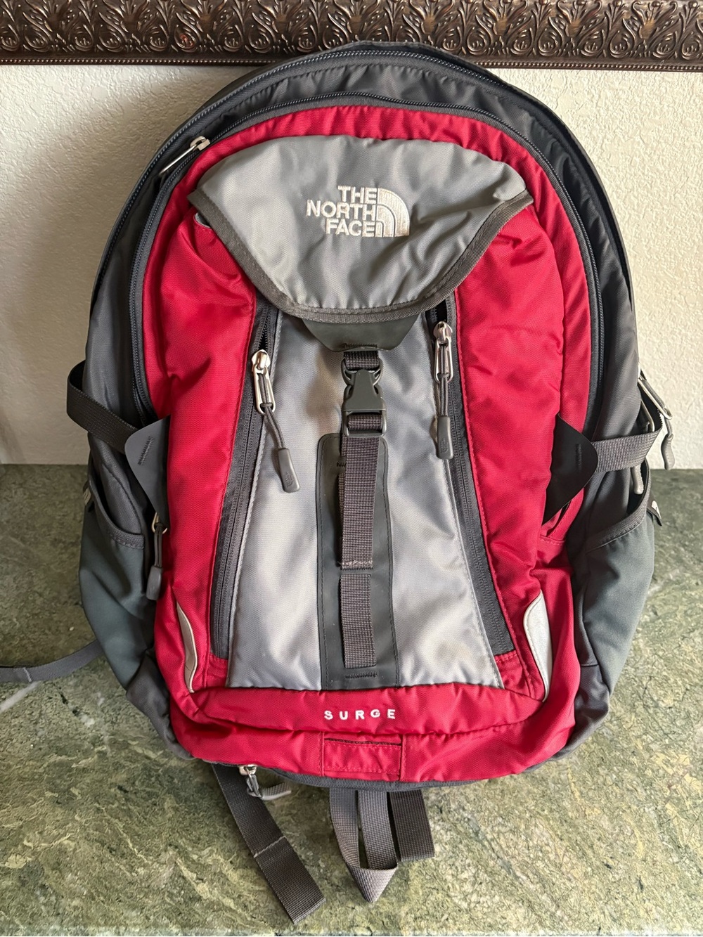 The North Face Surge Backpack Men's Women's Gray And Red